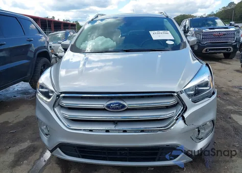 2019 Ford Escape Titanium z USA, uszkodzony, nr VIN 1FMCU9J9XKUB76466